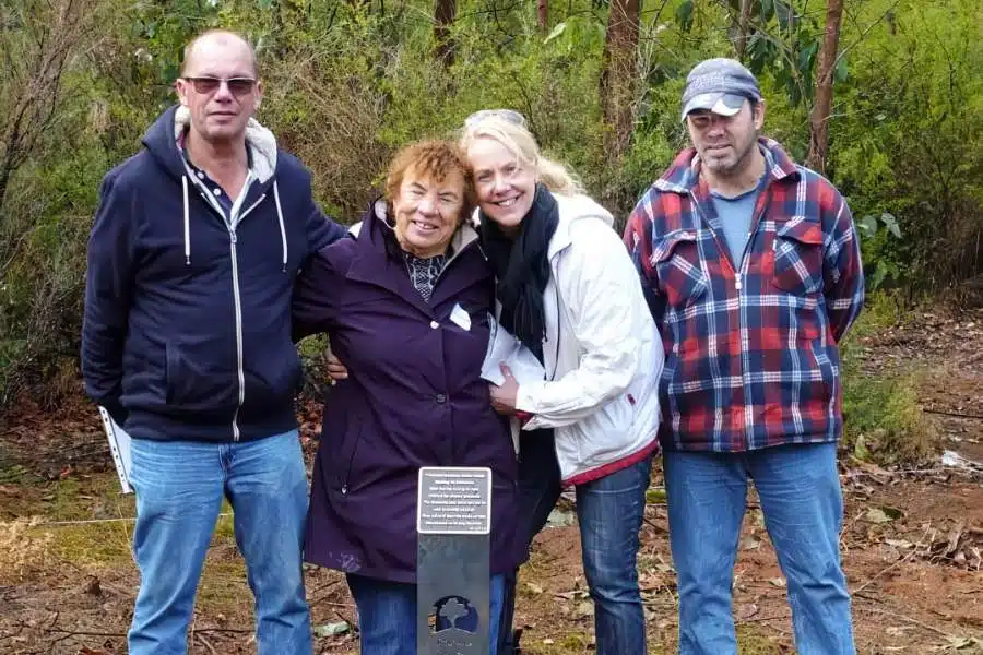 A family planting A Living Legacy Tree at Wellington Dam Living Legacy Forest
