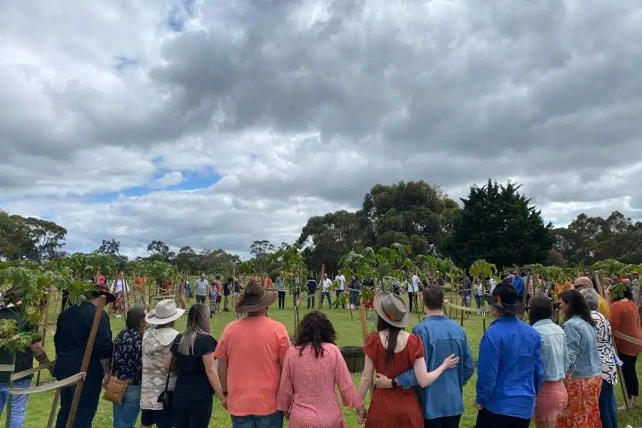 A family celebrating life of their loved ones with a Living Legacy Tree at Mornington Green Living Legacy Gardens