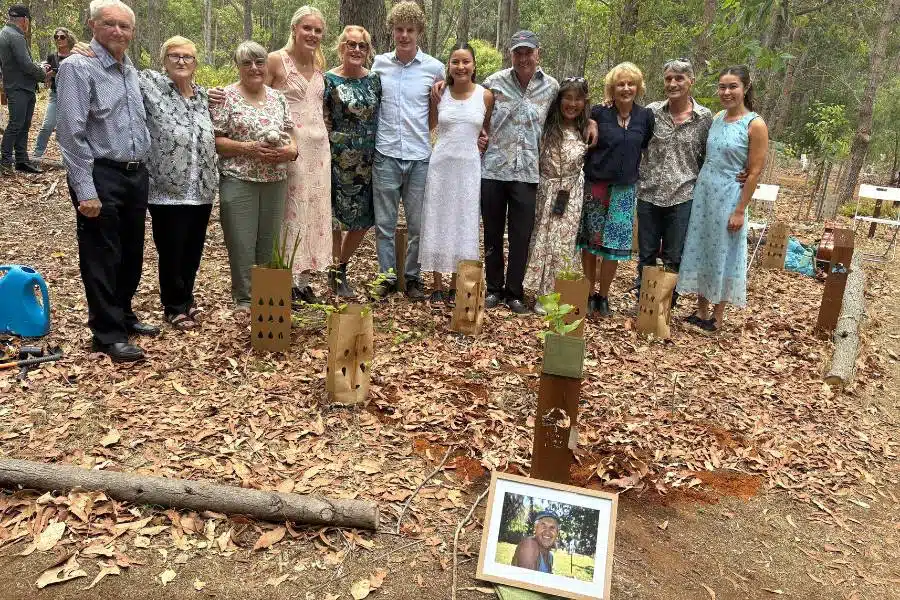 A family having a Living Legacy Tree planting ceremony as a part of fun funeral by Living Legacy Forest Australia