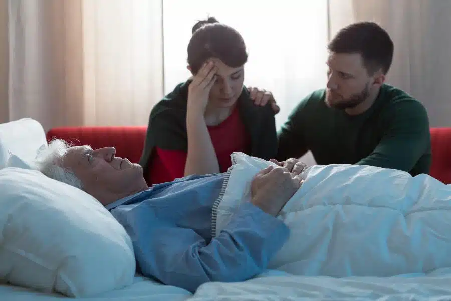Children talking to their dying father